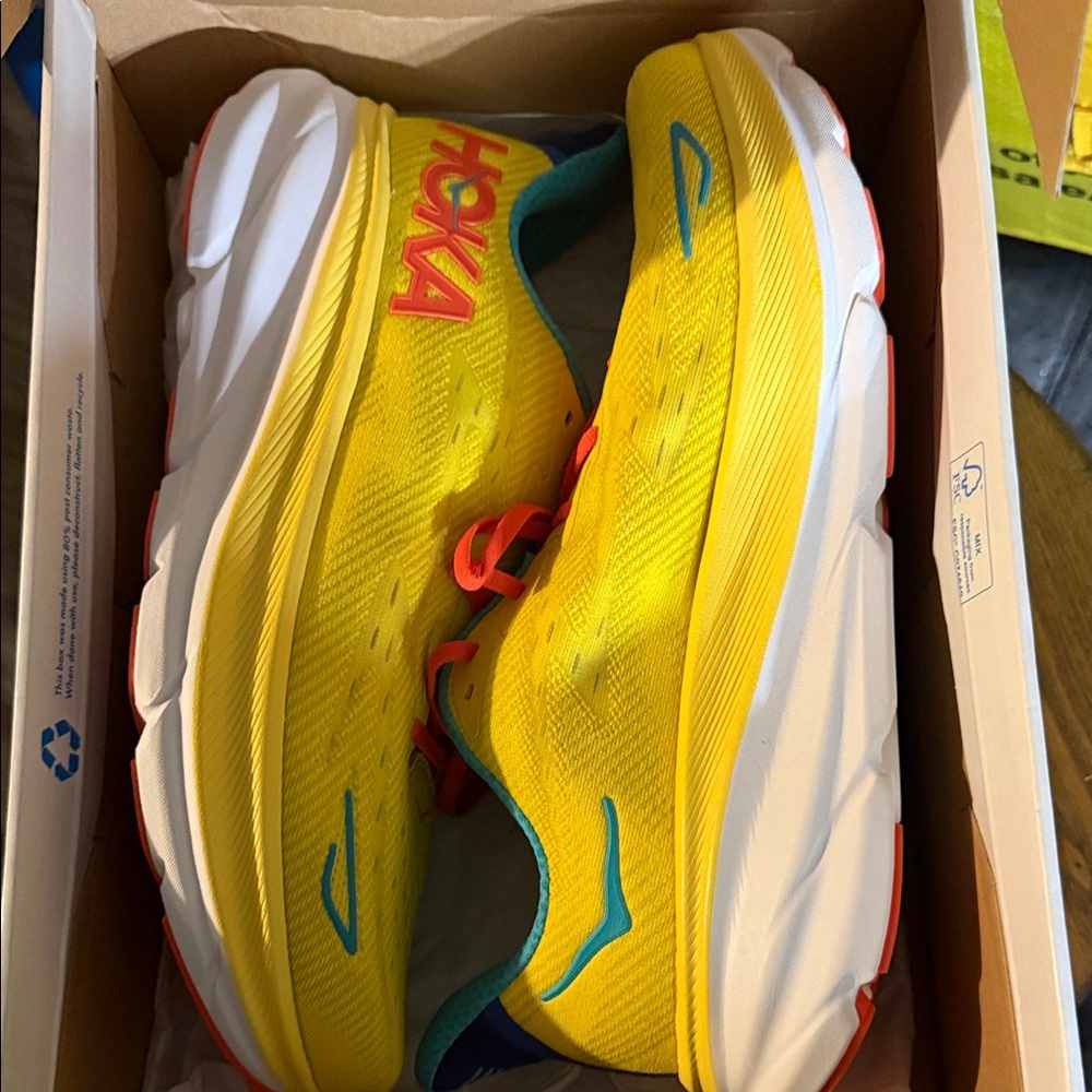 Hoka Kids Yellow Running Sneakers with Teal Accents and Orange Laces